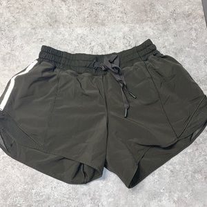 Old lululemon style short. Olive green. Good condition. Liner in short.